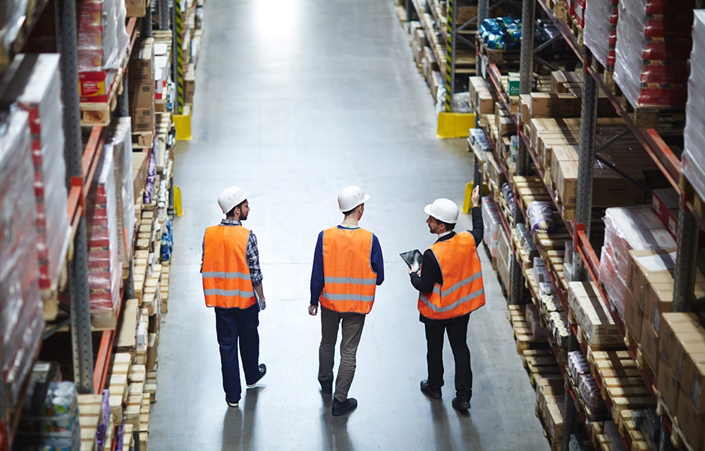 Warehouse Operations with Employees Walking through the Warehouse - Micro Accounting